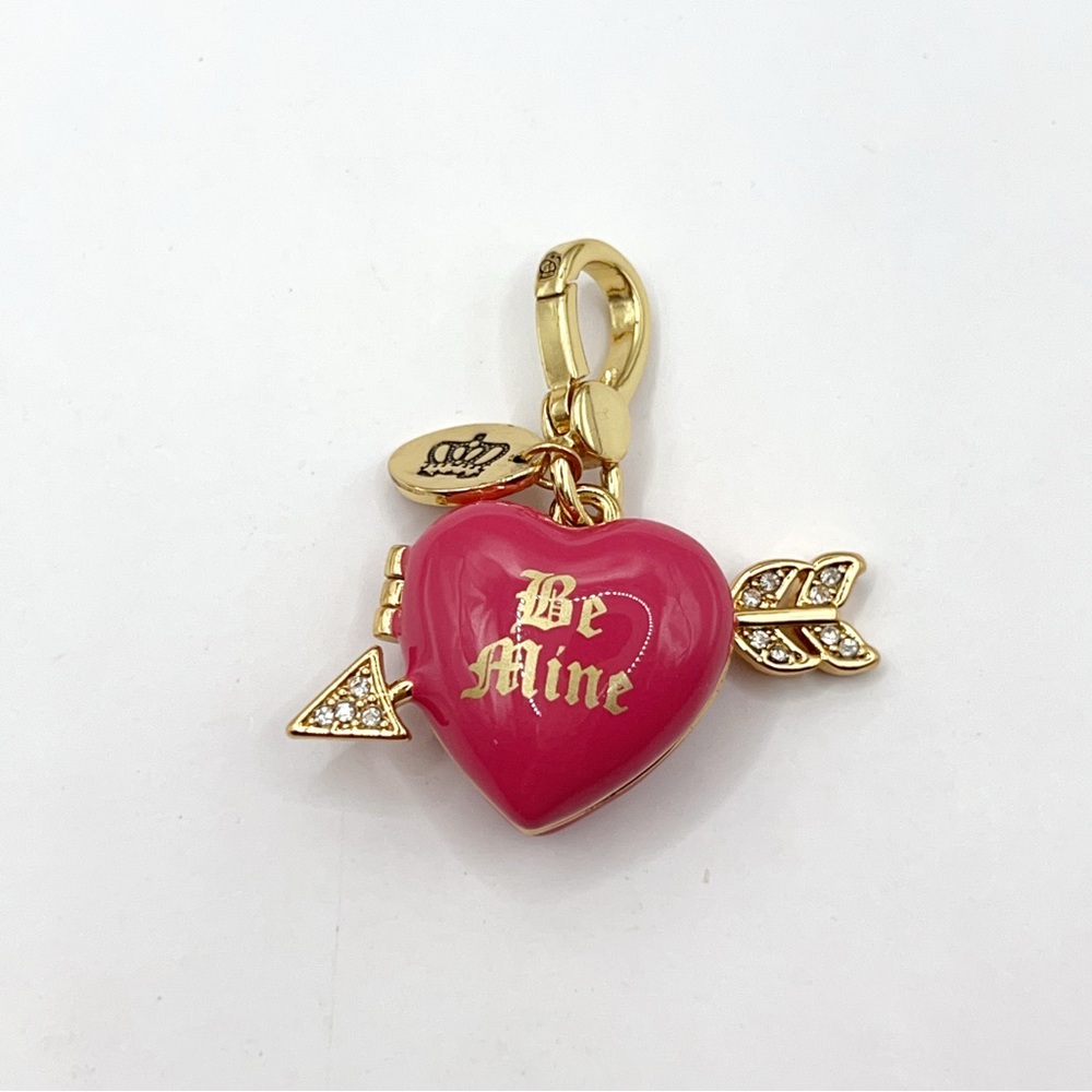 Juicy Couture pink heart locket with arrow charm
